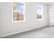 Bedroom featuring plush carpeting and multiple windows for natural light at 764 Dorset Stream Dr, Fuquay Varina, NC 27526