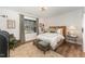 Comfortable bedroom with neutral tones, stylish decor, and a relaxing atmosphere at 8208 Bella Oak Ct, Wake Forest, NC 27587