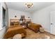 Tastefully decorated bedroom featuring two twin beds, plush rug, and natural light from the window at 8208 Bella Oak Ct, Wake Forest, NC 27587