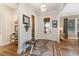 Bright and airy foyer featuring hardwood floors and stylish decor at 8208 Bella Oak Ct, Wake Forest, NC 27587