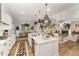 Open concept kitchen with a large island, stainless steel appliances, and views to the Gathering room at 8208 Bella Oak Ct, Wake Forest, NC 27587