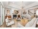Spacious living room with fireplace, hardwood floors, and sophisticated decor at 8208 Bella Oak Ct, Wake Forest, NC 27587