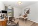 Cozy office space with a large window, modern decor, and ample workspace at 8208 Bella Oak Ct, Wake Forest, NC 27587