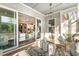Cozy covered patio with modern furniture, perfect for relaxing and enjoying the outdoors at 8208 Bella Oak Ct, Wake Forest, NC 27587