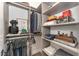 Organized walk-in closet with custom shelving and hanging space for clothes and accessories at 8208 Bella Oak Ct, Wake Forest, NC 27587