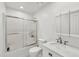 Clean bathroom with a shower, toilet, and vanity with modern fixtures at 905 Tyler Ct, Garner, NC 27529