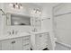 Bathroom featuring dual vanities, updated fixtures and walk-in shower at 905 Tyler Ct, Garner, NC 27529