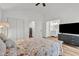 This bedroom features wood floors, neutral paint and en suite bathroom at 905 Tyler Ct, Garner, NC 27529
