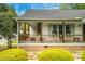 Charming front porch with comfortable seating, perfect for relaxing outdoors at 905 Tyler Ct, Garner, NC 27529