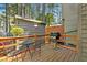 Outdoor patio with table and grill surrounded by trees, perfect for relaxing or entertaining at 918 Albany Ct, Raleigh, NC 27615