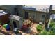 Aerial view of the backyard, showing the wooden deck, storage shed, landscaping, and outdoor space at 918 Albany Ct, Raleigh, NC 27615