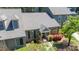 Attractive gray home highlighting its well-kept exterior, complete with an inviting entrance and lush landscaping at 918 Albany Ct, Raleigh, NC 27615