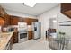 Traditional kitchen features stainless steel appliances and granite countertops at 918 Albany Ct, Raleigh, NC 27615