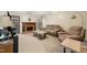 Comfortable living room with a cozy fireplace and plush seating at 918 Albany Ct, Raleigh, NC 27615