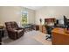 Home office with ample desk space and comfortable seating area at 918 Albany Ct, Raleigh, NC 27615
