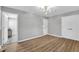 Spacious empty bedroom with two closets and access to the bathroom at 924 Lynn Rd, Durham, NC 27703