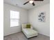 Cozy bedroom with large window and comfortable seating area at 929 Mailwood Dr, Knightdale, NC 27545