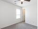 Light-filled bedroom boasts carpeted floors, a ceiling fan, and a bright window at 929 Mailwood Dr, Knightdale, NC 27545