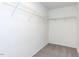 Walk-in closet features carpeted floors and wire shelving for optimal storage at 929 Mailwood Dr, Knightdale, NC 27545