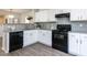 Well-equipped kitchen with modern appliances, granite countertops, and ample cabinet space at 929 Mailwood Dr, Knightdale, NC 27545