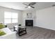 Bright living room with a fireplace, neutral colors, and ample natural light at 929 Mailwood Dr, Knightdale, NC 27545