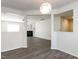 Bright living room featuring a fireplace, hardwood floors, and decorative lighting at 929 Mailwood Dr, Knightdale, NC 27545