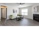 Inviting living room with a fireplace, neutral colors, and ample natural light at 929 Mailwood Dr, Knightdale, NC 27545