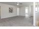 Spacious upstairs loft with neutral carpet, recessed lighting and ceiling fan at 929 Mailwood Dr, Knightdale, NC 27545
