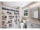 Bathroom featuring a toilet, white vanity, and a bathtub with a forest-themed shower curtain at 9947 Nc Hwy 96 N, Selma, NC 27576