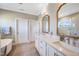 Bright bathroom with double sinks, soaking tub, and neutral color palette at 9947 Nc Hwy 96 N, Selma, NC 27576