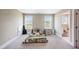 Bedroom with carpet, windows, and en-suite bathroom with shower, toilet and vanity at 9947 Nc Hwy 96 N, Selma, NC 27576