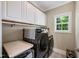Well-organized laundry room with modern appliances and ample storage at 9947 Nc Hwy 96 N, Selma, NC 27576