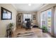 Home office featuring French doors, large windows, and neutral decor at 9947 Nc Hwy 96 N, Selma, NC 27576