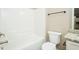Bright bathroom with a tub, white toilet, shower and vanity with granite countertop at 1004 Longleaf Pine Pl, Mebane, NC 27302