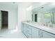 Light and bright bathroom with double sink vanity and granite counters at 1004 Longleaf Pine Pl, Mebane, NC 27302