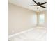 Bright bedroom featuring neutral walls, a ceiling fan, and a window that provides natural light at 1004 Longleaf Pine Pl, Mebane, NC 27302