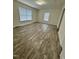Cozy bedroom filled with natural light from multiple windows with a neutral color to match your furniture at 1010 Pool Rock Rd, Henderson, NC 27537