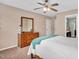 Bedroom with neutral walls, carpet, and a window with blinds at 1027 Upchurch Farm Ln, Cary, NC 27519