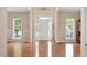 Bright and open foyer with hardwood floors and ample natural light at 1027 Upchurch Farm Ln, Cary, NC 27519