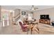 Inviting living room with open floor plan, comfortable seating, and staircase access enhancing the home's flow at 1027 Upchurch Farm Ln, Cary, NC 27519