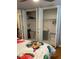 Bedroom with closet featuring open doors and shelving at 1045 Nichols Dr, Raleigh, NC 27605