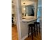 Kitchen counter bar area offering a view of kitchen and living room at 1045 Nichols Dr, Raleigh, NC 27605