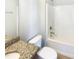 Functional bathroom features a tub-shower, granite vanity, and neutral wall color at 108 Warm Wood Ln, Apex, NC 27539