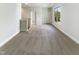 Second-floor loft space with carpet and a window to let in natural light at 108 Warm Wood Ln, Apex, NC 27539