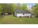 Exterior of home with well-maintained lawn, shed, and air conditioning unit at 1106 Lake Ridge Dr, Creedmoor, NC 27522
