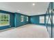 The bedroom features a large window and lots of space at 1216 Edgemoore Trl, Wake Forest, NC 27587