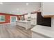 The kitchen features new appliances, a kitchen island, and hardwood floors at 1216 Edgemoore Trl, Wake Forest, NC 27587