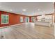 The living room features hardwood floors, large windows, and plenty of light at 1216 Edgemoore Trl, Wake Forest, NC 27587