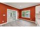 The eat-in kitchen area features large windows and sliding glass doors at 1216 Edgemoore Trl, Wake Forest, NC 27587