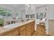 Bathroom with double sinks, natural light, and a doorway into the bedroom at 1318 Indian Camp Rd, Chapel Hill, NC 27516